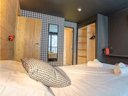 Cliquez pour découvrir toutes les photos de l'HÉBERGEMENT ! chambre - résidence Résidences & Hôtels Le Cristal Lodge - Terrésens photo 2