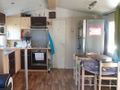 Cliquez pour découvrir toutes les photos de l'HÉBERGEMENT ! mobilhome - établissement Les Lacs De Courtes photo 4