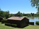 Cliquez pour découvrir toutes les photos de l'HÉBERGEMENT ! chalet - camping Et Village Vacances Le Lac photo 6