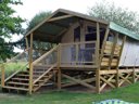 Cliquez pour découvrir toutes les photos de l'HÉBERGEMENT ! tente en toile et bois - camping Domaine De Kervallon photo 3