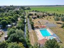 Camping Pas Cher vous présente avec son site Officiel campingpascher.fr, le Camping L'île Cariot classé 3 étoiles, situé sur la commune de Chaille Les Marais dans le département Vendée (Pays De La Loire) en France. Le camping L'île Cariot vous propose un hébergement de type bungalow toilé de 20 m² pour 4 personnes. Cet hébergement propose plus de 73 dates différentes pour réserver ! Pour dévouvrir la période la moins chère, consultez la rubrique 'Tarifs' et sélectionnez votre mois de départ. L'établissement vous propose 10 autres types d'hébergements. Découvrez tous nos séjours à petits prix dans la commune et aux alentours de Chaille Les Marais du département : Vendée (Pays De La Loire). Les Avis clients pour le Camping L'île Cariot sont excellents avec une note moyenne de 8 sur 10. Rivière, Parc aquatique, Piscine chauffée, Piscine extérieure, Animations familiales, Aire de jeux enfants, Baby-foot, Canoë-kayak, Centre équestre, Court de tennis, Cyclisme, Golf, Ping-pong, Pétanque, Randonnée, Terrain de badminton, Terrain de volley-ball, Trampoline, Bar, Boulangerie, Bureau de tabac, Dépôt de pain, Snack/Bar, Épicerie,... En savoir plus : cliquez-ICI.