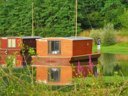Cliquez pour découvrir toutes les photos de l'HÉBERGEMENT ! hébergement insolite - camping Village Toue Du Domaine Des Demoiselles photo 1