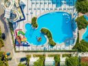 Cliquez pour découvrir toutes les photos de l'ÉTABLISSEMENT ! camping Residence Village photo 2