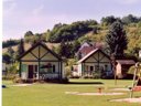 Cliquez pour découvrir toutes les photos de l'ÉTABLISSEMENT ! camping Village Chalets – Le Rû Du Pré photo 1