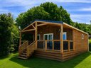 Cliquez pour découvrir toutes les photos de l'HÉBERGEMENT ! chalet - camping La Pierre De L'Aigle photo 1