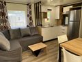 Cliquez pour découvrir toutes les photos de l'HÉBERGEMENT ! mobilhome - établissement Chateau De Bouafles photo 3