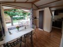 Cliquez pour découvrir toutes les photos de l'HÉBERGEMENT ! chalet - camping Le Verger De Jastres photo 3