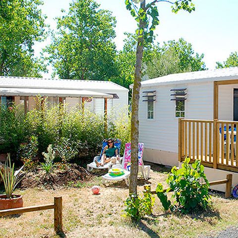 Cliquez pour découvrir toutes les photos de l'HÉBERGEMENT ! mobilhome - Méditerranée Plage photo 2