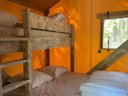 Cliquez pour découvrir toutes les photos de l'HÉBERGEMENT ! tente en toile et bois - camping Lodges & Nature photo 4