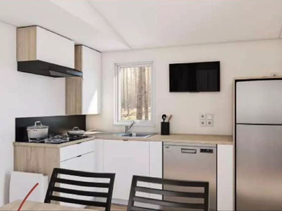 Cliquez pour découvrir toutes les photos de l'HÉBERGEMENT ! mobile_home - Du Château De L'Hom photo 3