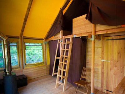 Cliquez pour découvrir toutes les photos de l'HÉBERGEMENT ! tente en toile et bois - Bivouac Nature photo 7