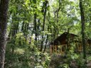 Cliquez pour découvrir toutes les photos de l'HÉBERGEMENT ! tente en toile et bois - camping Le Camp photo 3