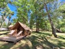 Cliquez pour découvrir toutes les photos de l'HÉBERGEMENT ! tente en toile et bois - camping Au Valbonheur photo 3