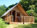 Cliquez pour découvrir toutes les photos de l'HÉBERGEMENT ! tente toile et bois - établissement Douce Ardèche photo 1