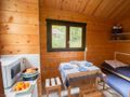 Cliquez pour découvrir toutes les photos de l'HÉBERGEMENT ! chalet - camping Collonges La Rouge photo 3