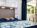 Cliquez pour découvrir toutes les photos de l'HÉBERGEMENT ! bungalow - camping Village Baia Azzurra photo 3