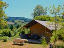 Cliquez pour découvrir toutes les photos de l'HÉBERGEMENT ! tente en toile et bois - camping La Chabanne photo 8