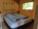Cliquez pour découvrir toutes les photos de l'HÉBERGEMENT ! tente en toile et bois - camping La Chabanne photo 10